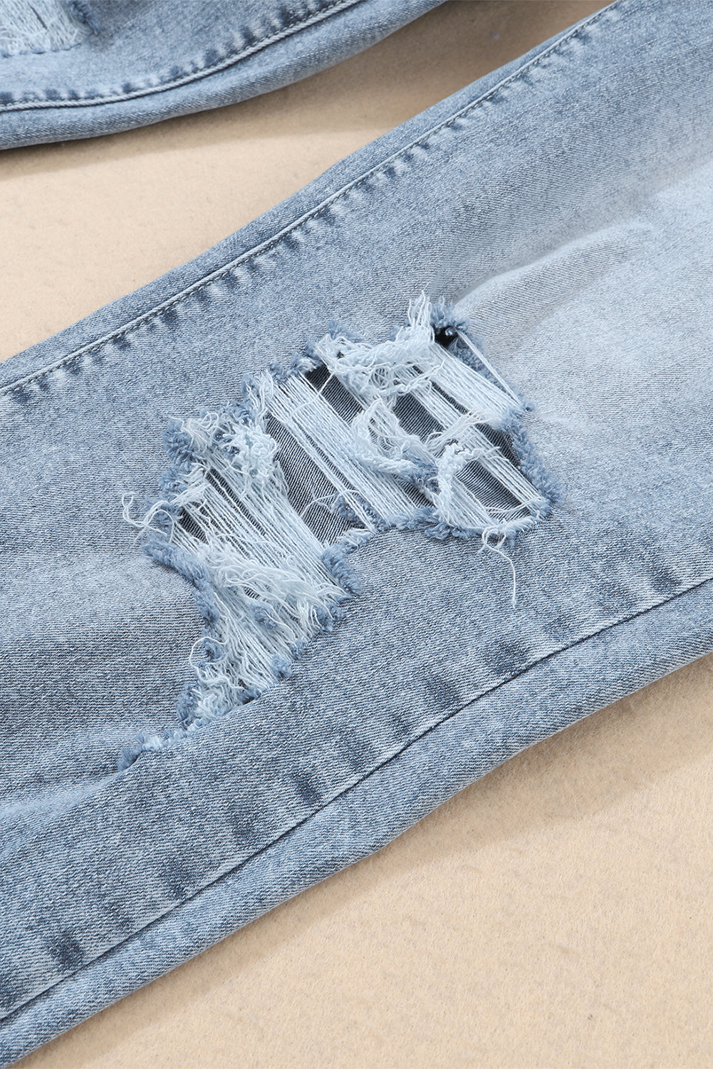 Delilah Light Wash Frayed Hem Destructed Slim Jeans